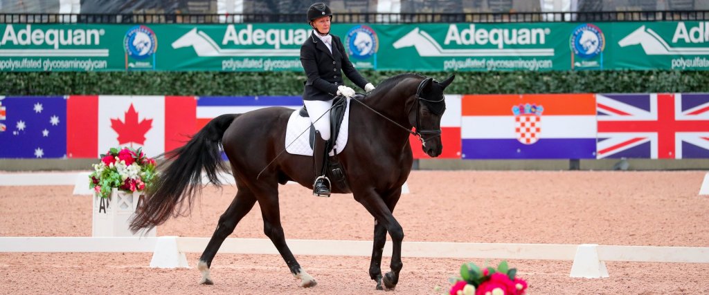Winona Hartvikson Para-Dressage High Performance Athlete feeds Aloeride